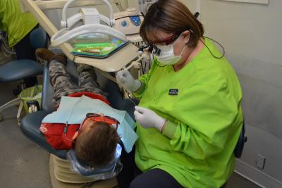 Dental Hygienist with child